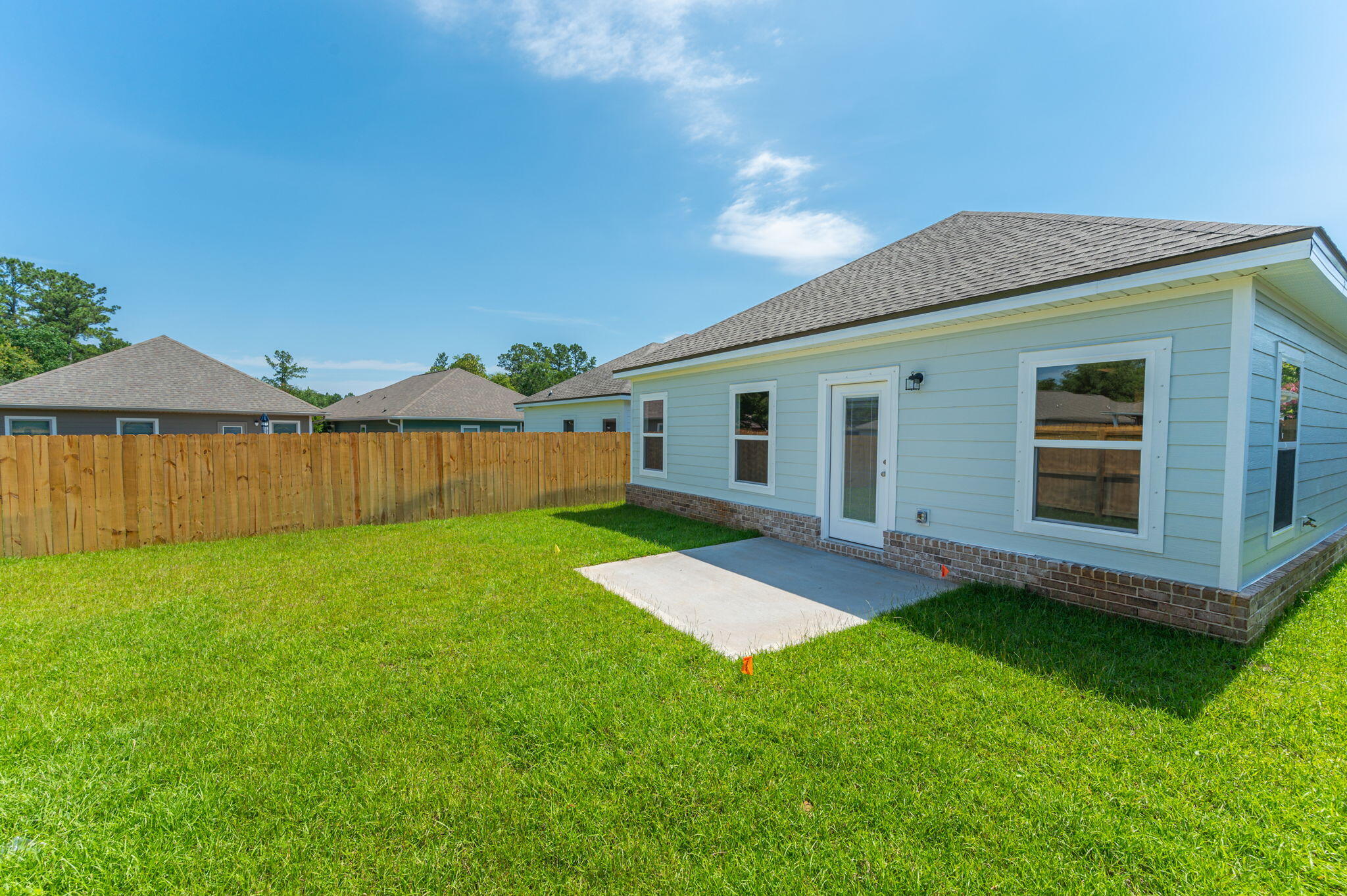 73 Lafayette Creek Freeport, FL 32439 - Photo 30 of 38 a view of a backyard with a garden and plants