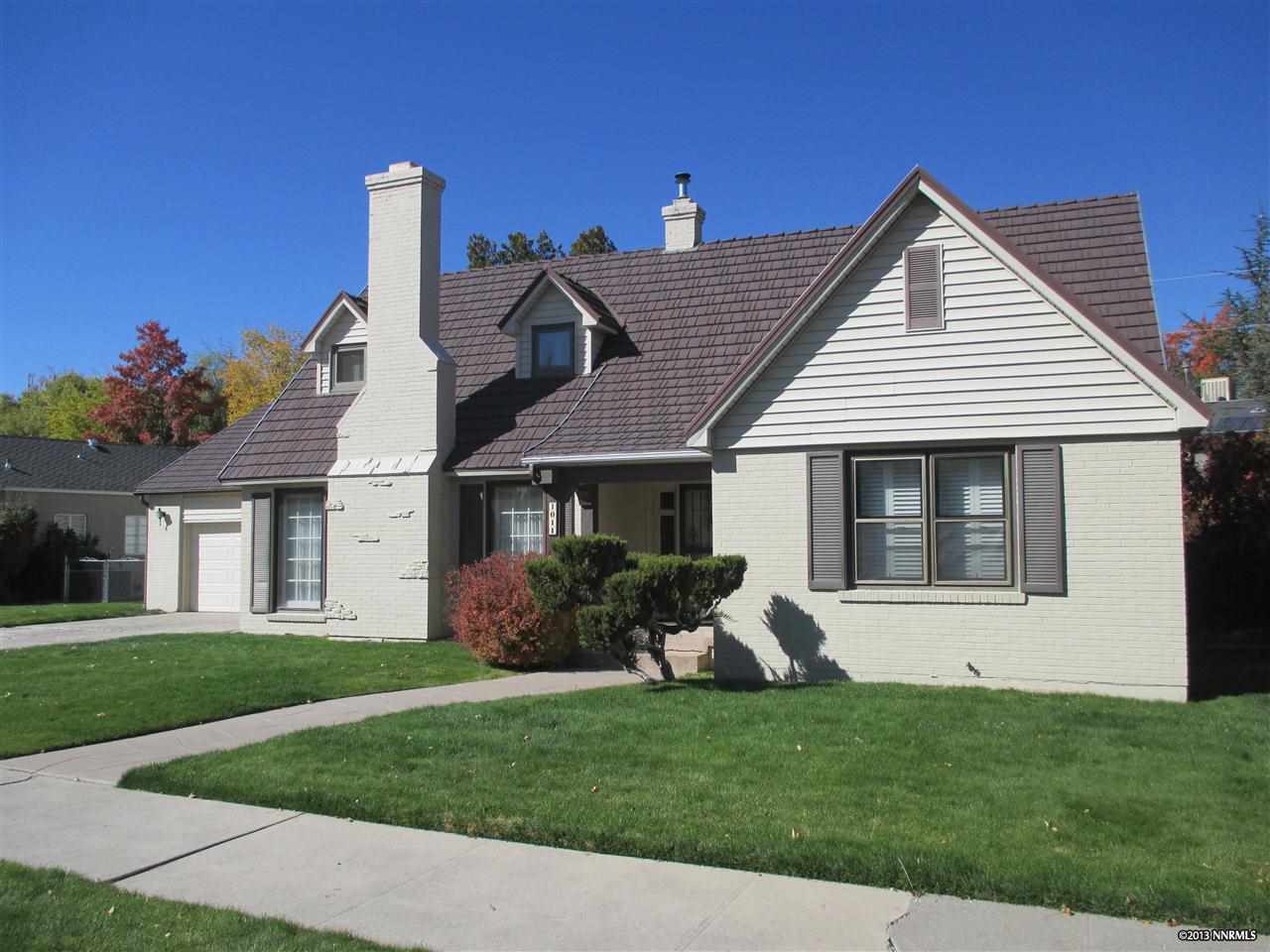 1011 Manor Drive Reno, NV 89509 - Photo 1 of 1 a front view of a house with a garden and plants