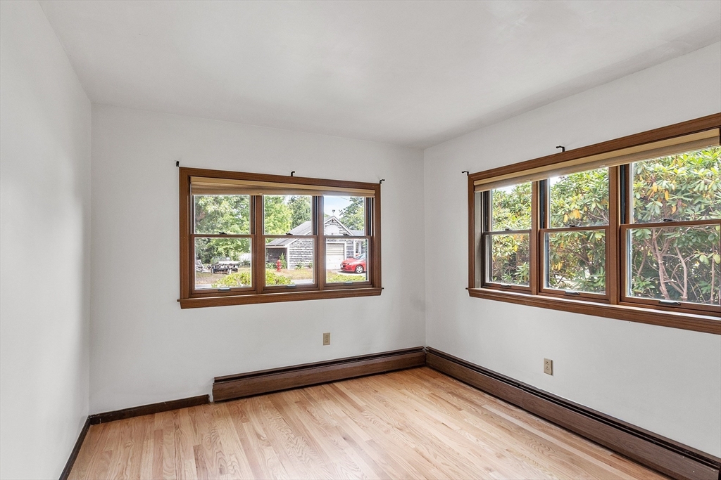4 22nd Street Wareham, MA 02558 - Photo 19 of 22 a view of a room with wooden floor and a window