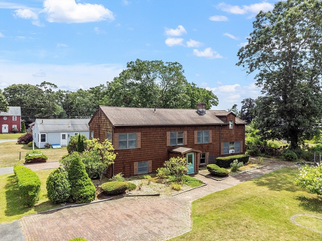 4 22nd Street Wareham, MA 02558 - Photo 20 of 22 a view of a house with a patio