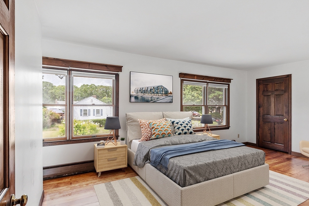 4 22nd Street Wareham, MA 02558 - Photo 8 of 22 a bedroom with a large bed and a window