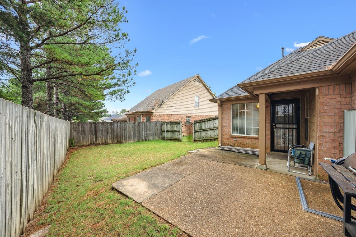 10076 Cross Ridge Road Cordova, TN 38018 - Photo 19 of 21 View of yard featuring a patio area