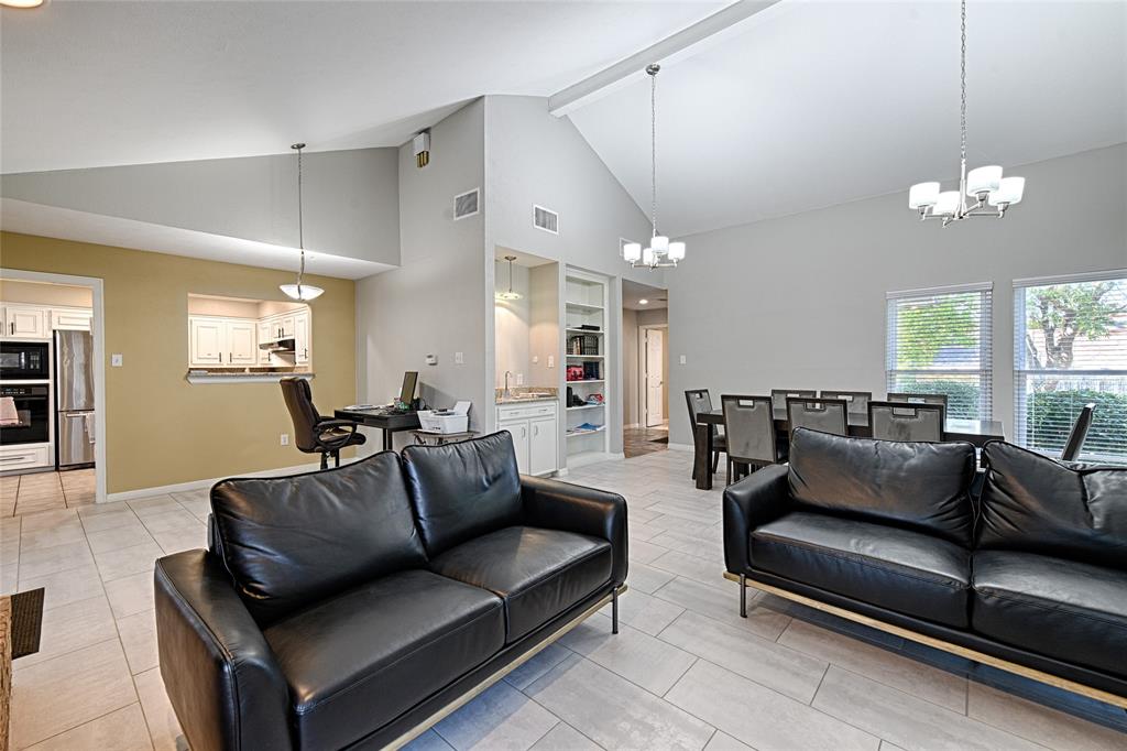 15632 Moondust Drive Dallas, TX 75248 - Photo 11 of 36 a living room with furniture and a large window