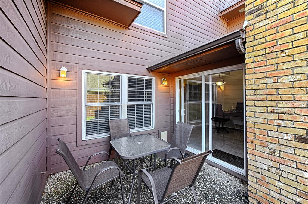 15632 Moondust Drive Dallas, TX 75248 - Photo 33 of 36 a view of a house with backyard and sitting area