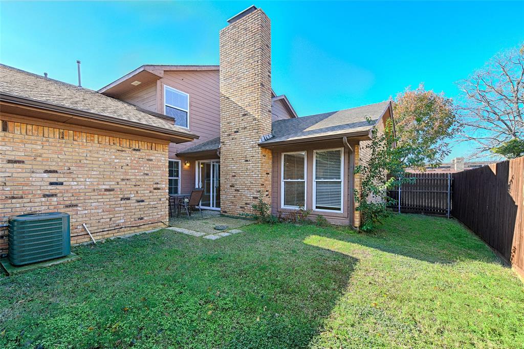 15632 Moondust Drive Dallas, TX 75248 - Photo 35 of 36 a view of a house with a yard