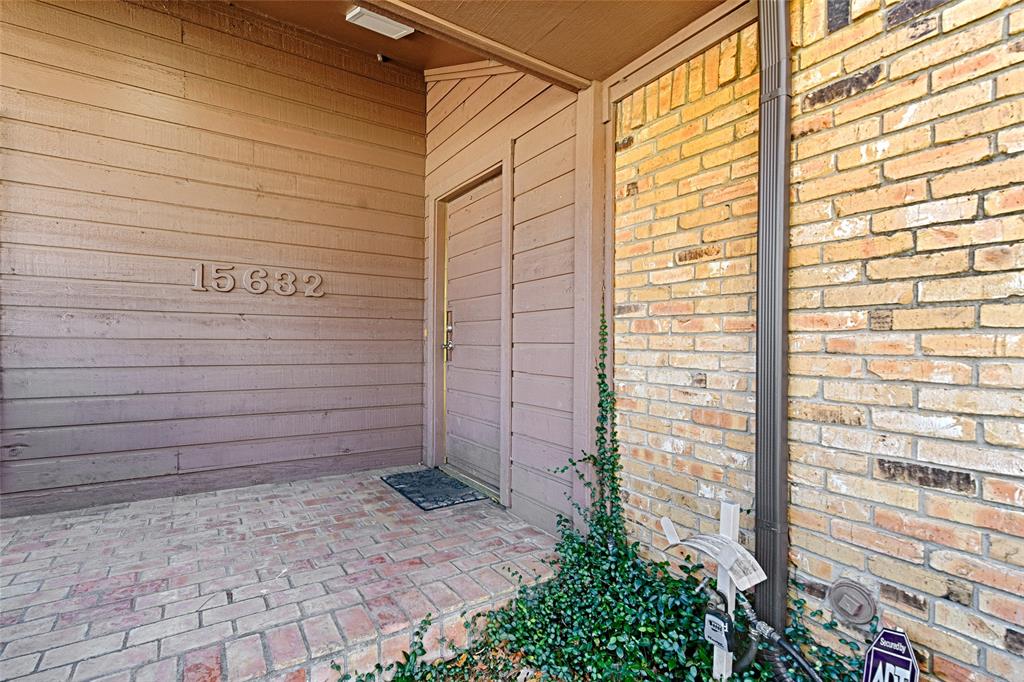 15632 Moondust Drive Dallas, TX 75248 - Photo 4 of 36 Property entrance with brick siding
