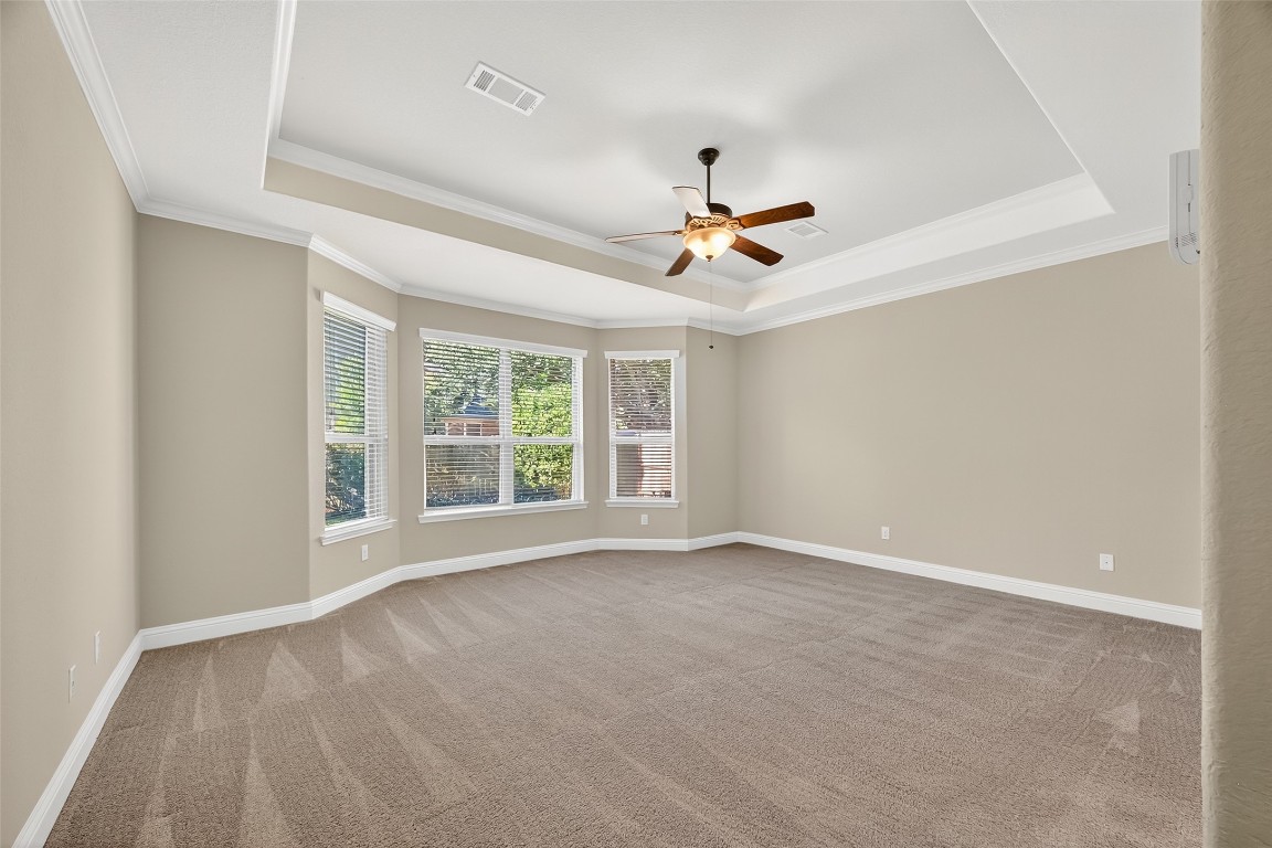 21331 Winding Path Way Richmond, TX 77406 - Photo 19 of 42 a view of an empty room with a window