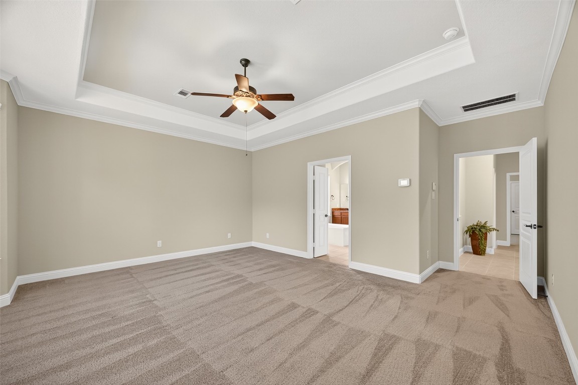 21331 Winding Path Way Richmond, TX 77406 - Photo 20 of 42 a view of a livingroom with a ceiling fan & entryway