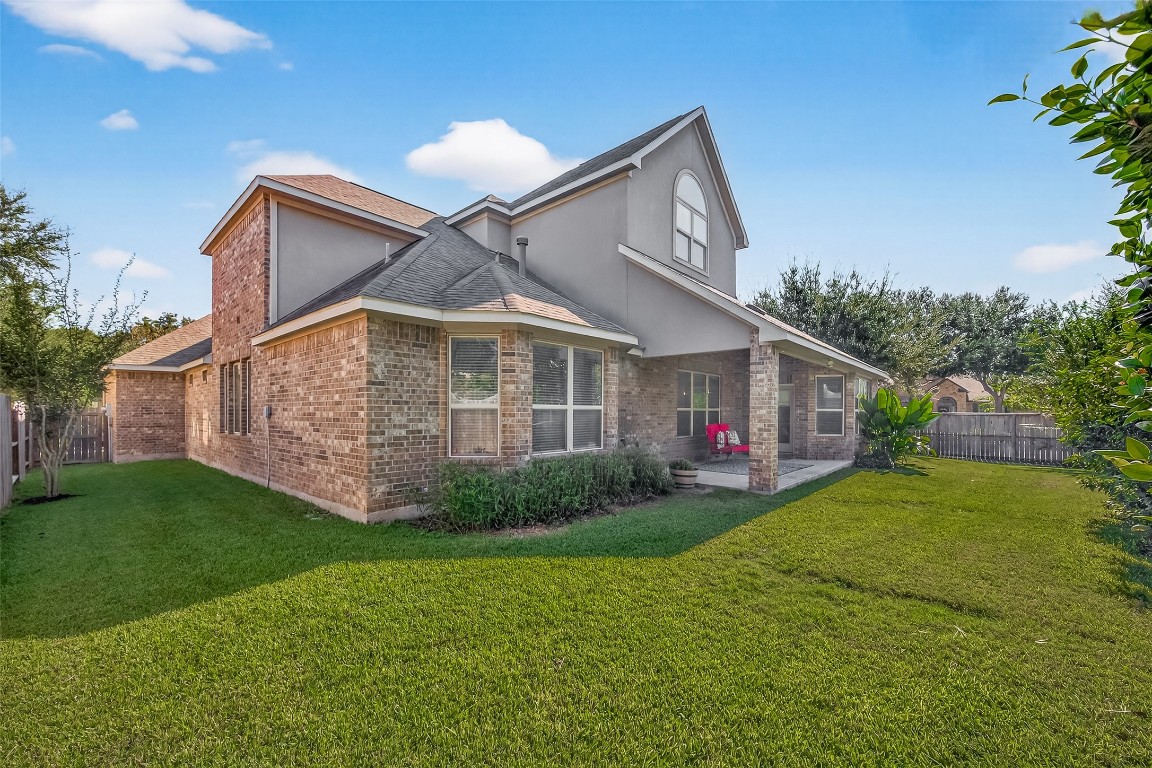 21331 Winding Path Way Richmond, TX 77406 - Photo 36 of 42 a view of a house with a yard
