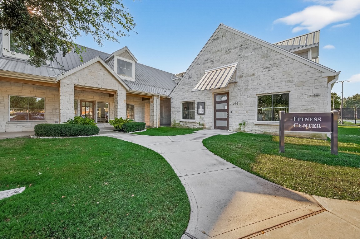 21331 Winding Path Way Richmond, TX 77406 - Photo 39 of 42 a front view of a house with a yard and trees