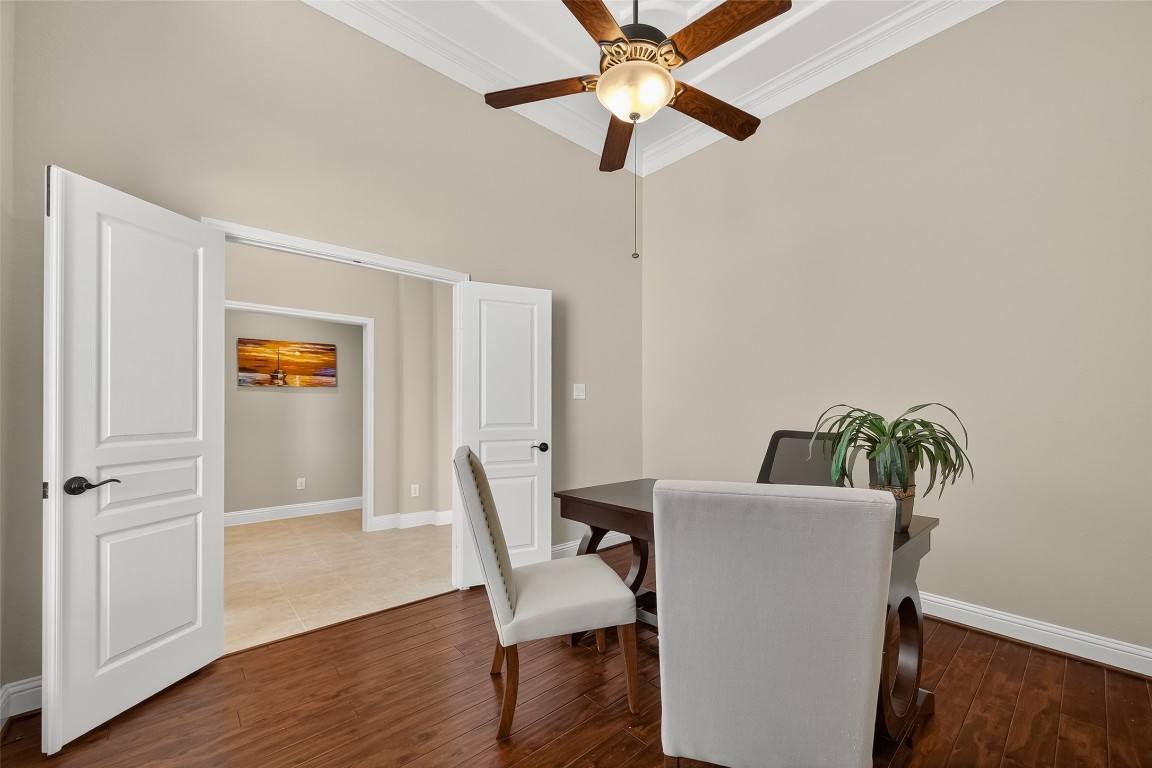 21331 Winding Path Way Richmond, TX 77406 - Photo 6 of 42 a view of a dining room with furniture and wooden floor