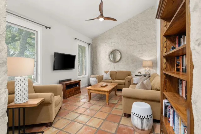 a view of entryway with wooden floor and stairs