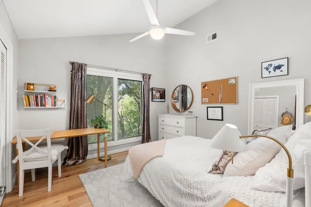 a view of an outdoor dining space with a table and chairs