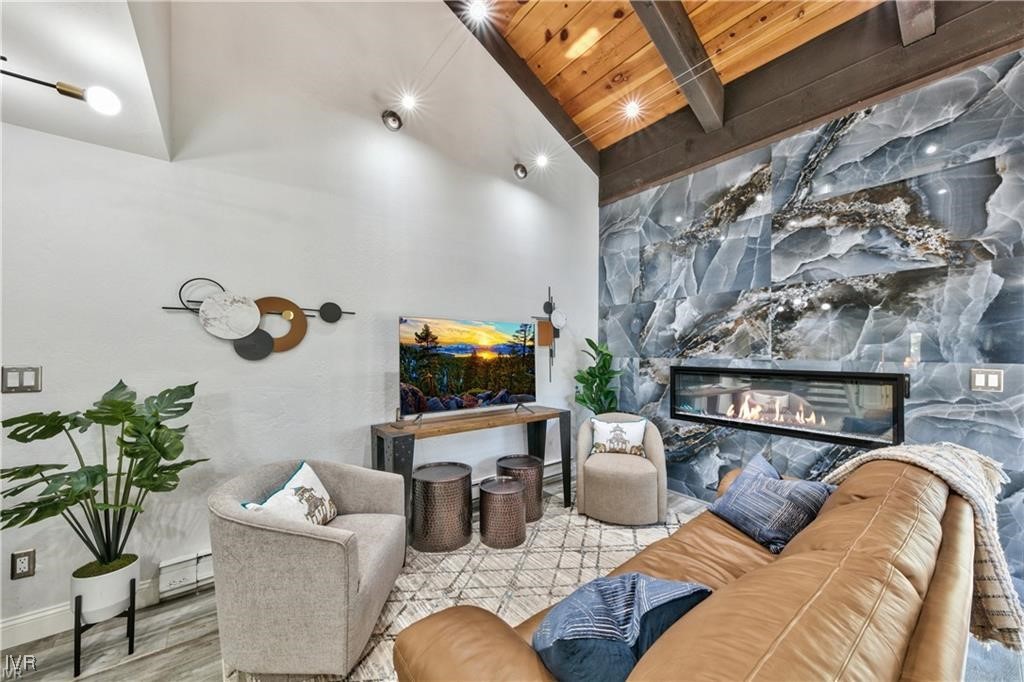 807 Alder Avenue, Unit 38 Incline Village, NV 89451 - Photo 1 of 15 a living room with furniture and a flat screen tv
