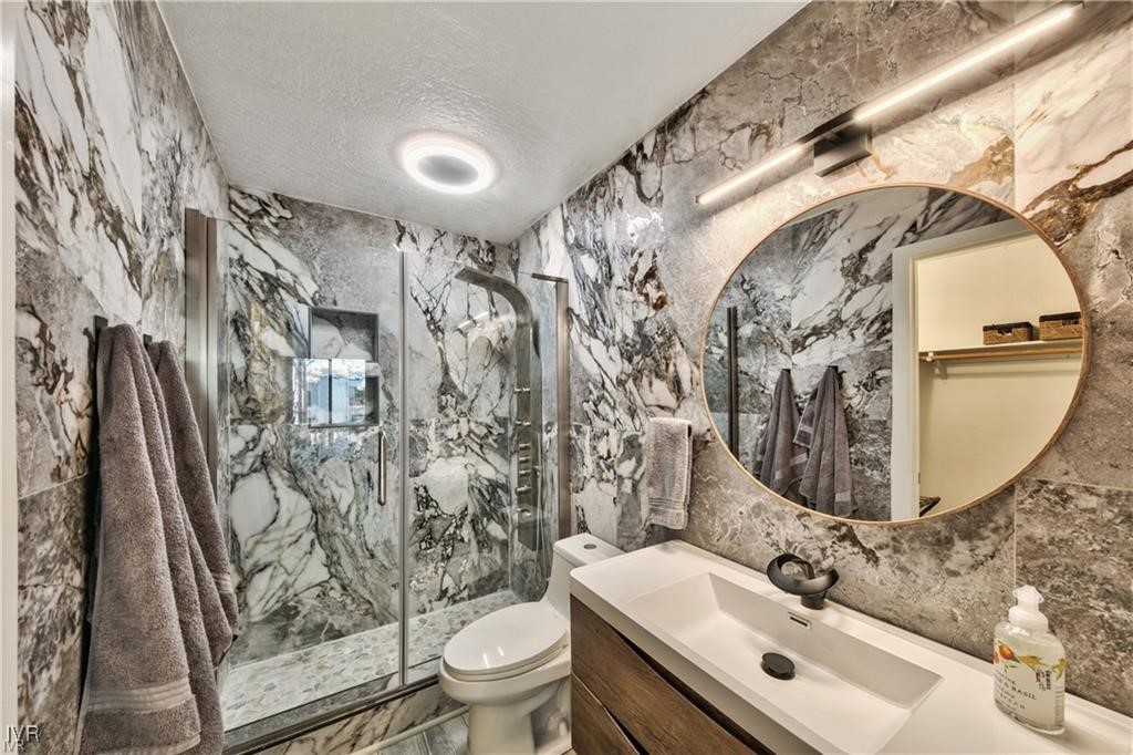 807 Alder Avenue, Unit 38 Incline Village, NV 89451 - Photo 7 of 15 a bathroom with a sink toilet and shower