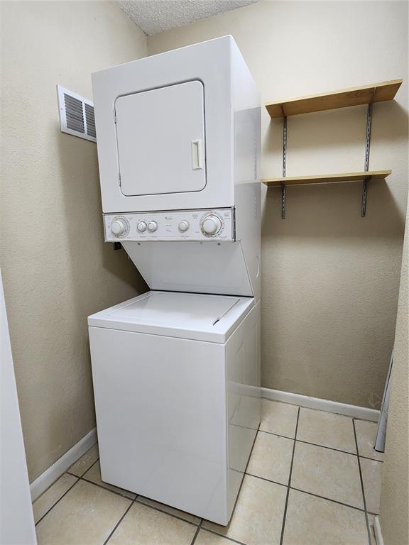 507 Northwest 39th Road, Unit 237 Gainesville, FL 32607 - Photo 14 of 21 a utility room with dryer and washer