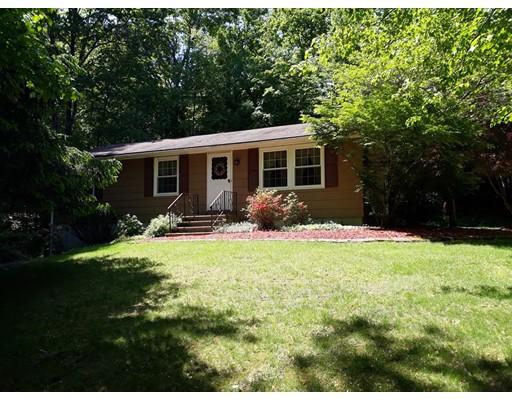 144 Whitins Road Sutton, MA 01590 - Photo 17 of 19 a front view of house with yard and green space