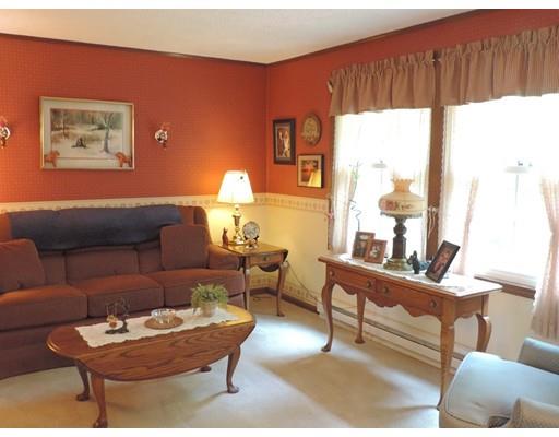 144 Whitins Road Sutton, MA 01590 - Photo 4 of 19 a living room with furniture and a large window