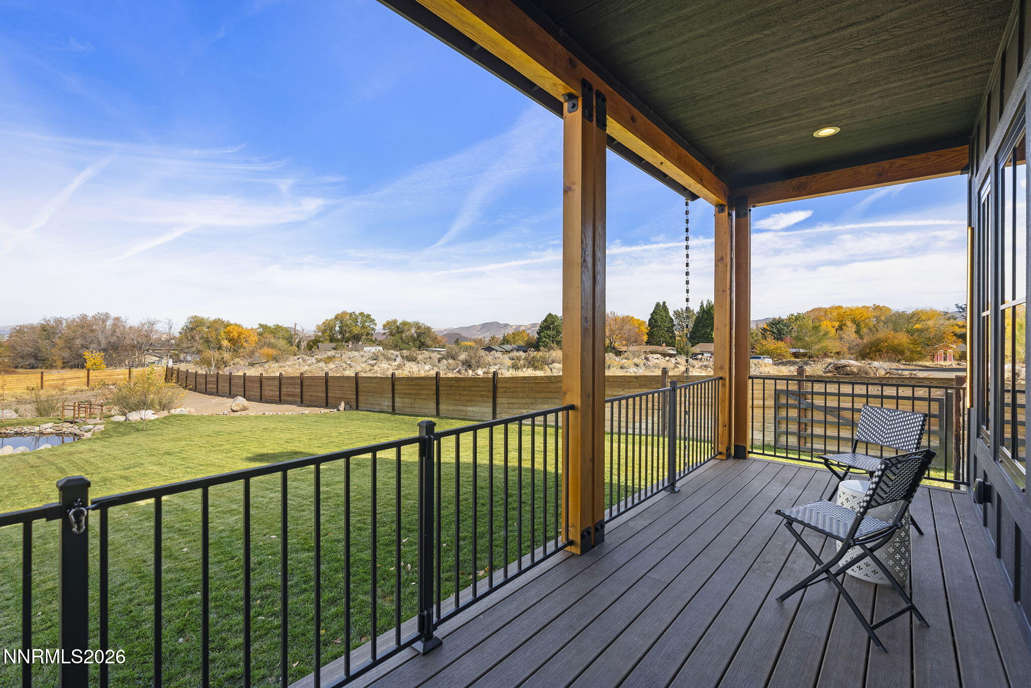 1426 Foothill Road Reno, NV 89511 - Photo 53 of 100 a view of roof deck with wooden floor and city view