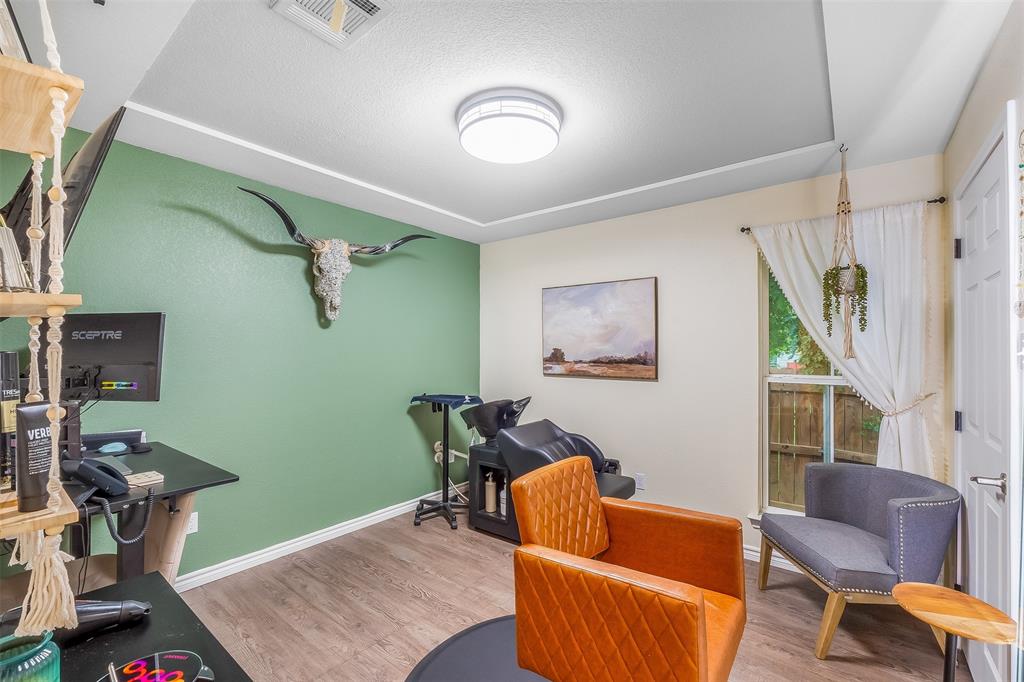 161 Columbia Street Cleburne, TX 76031 - Photo 12 of 19 a living room with furniture and a window