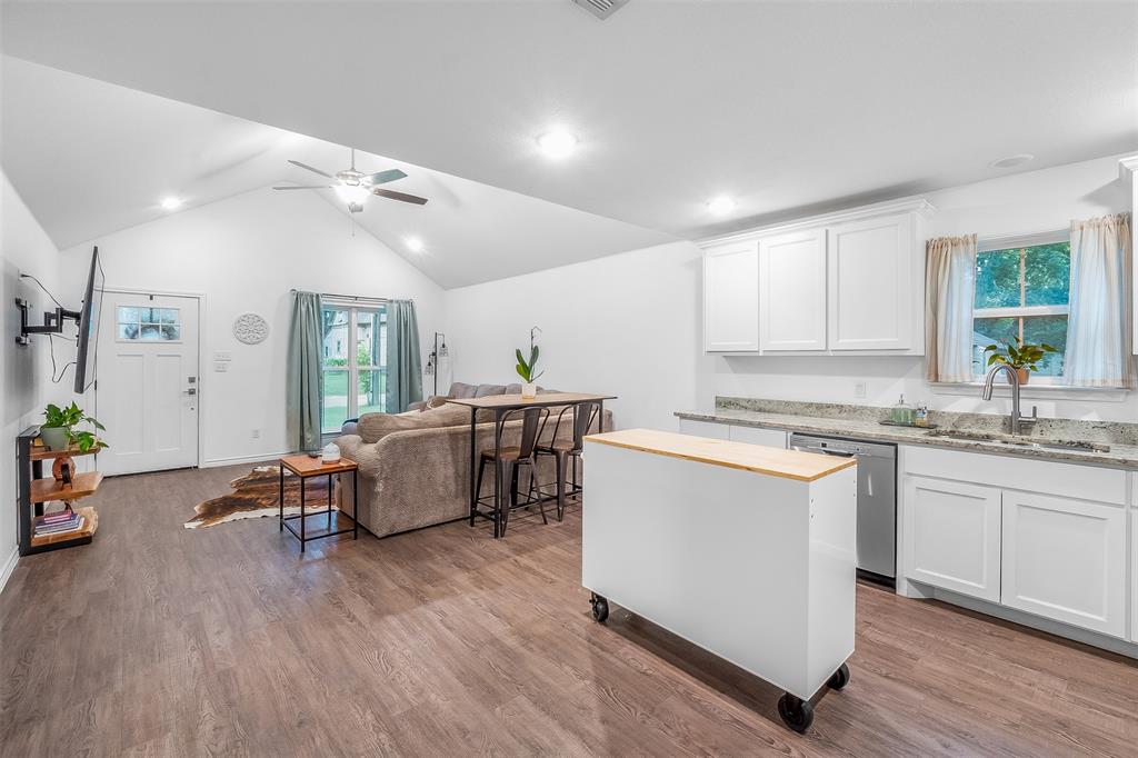 161 Columbia Street Cleburne, TX 76031 - Photo 7 of 19 a living room with furniture and a large window