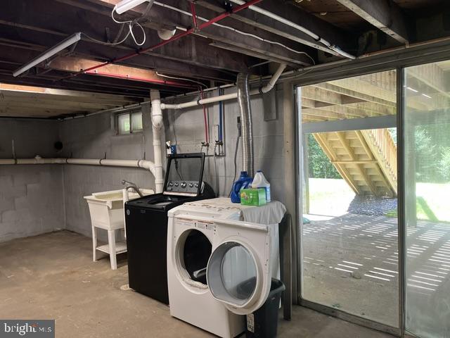 1663 Sawmill Road Spring City, PA 19475 - Photo 21 of 26 Bsmt Laundry with laundry tub. Access to back yard
