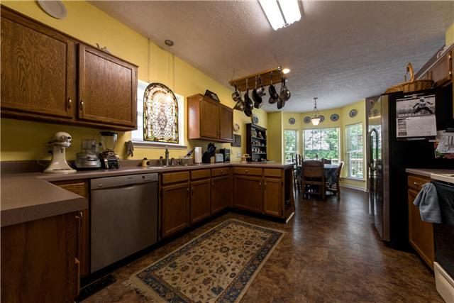 5216 Ridgefalls Way Antioch, TN 37013 - Photo 3 of 20 Bright, open & sunny, this Kitchen has generous amounts of counter space for preparing meals & cabinets to house your everyday stuff ...n your NOT so everyday stuff.