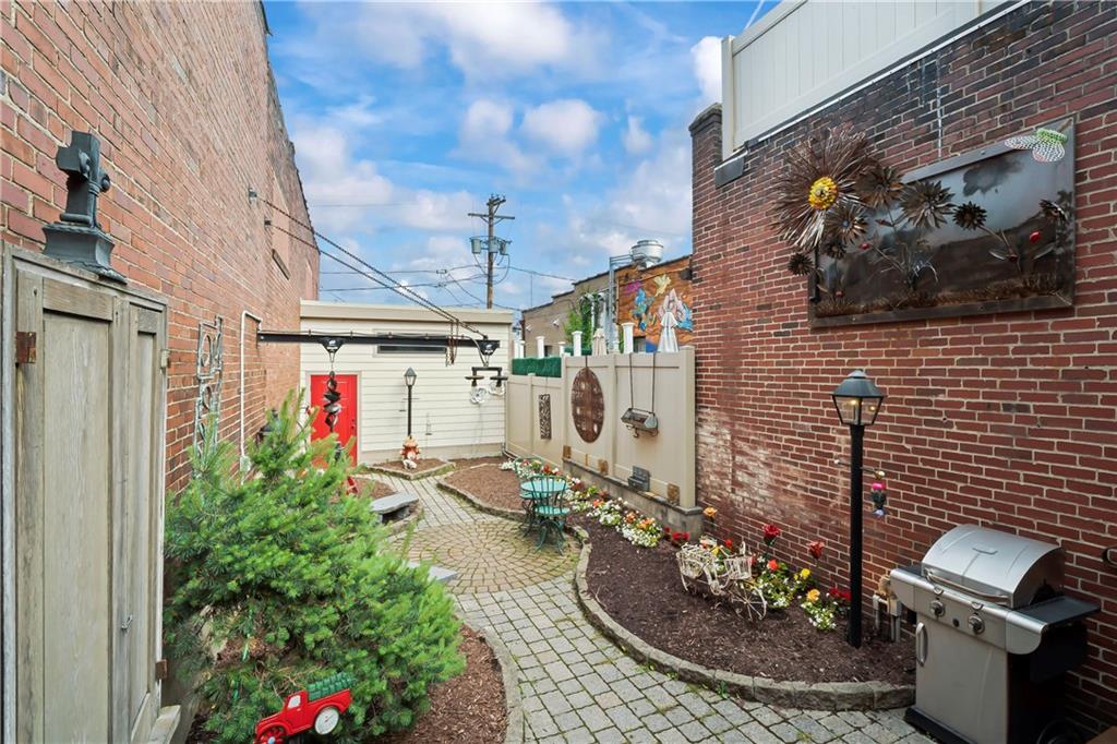 4119 Butler Street Pittsburgh, PA 15201 - Photo 12 of 23 a view of a porch with a dining space