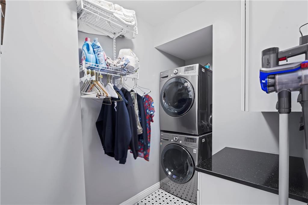 4119 Butler Street Pittsburgh, PA 15201 - Photo 17 of 23 a view of walk in closet with clothes and shoes