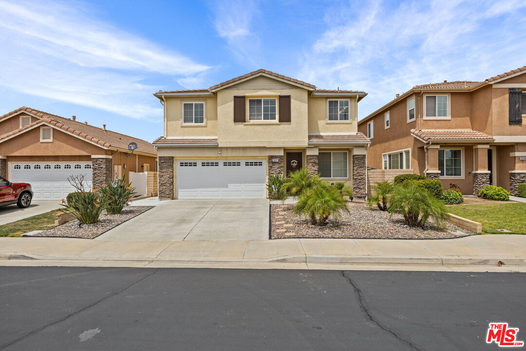 26692 Rim Creek Path Menifee, CA 92584 - Photo 2 of 41 front view of a house with a bench