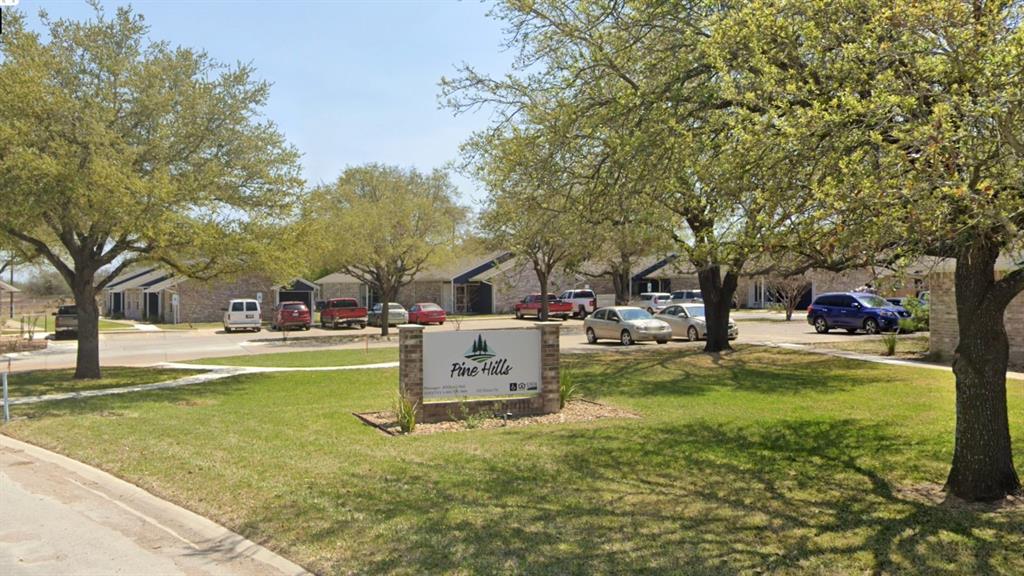 112 Dixon Drive Devine, TX 78016 - Photo 1 of 8 a view of a yard with swimming pool