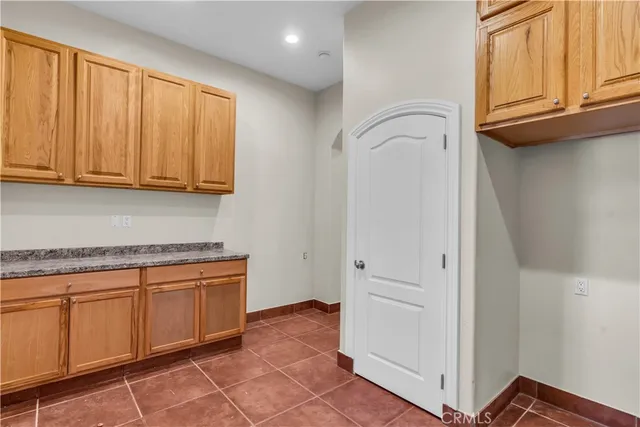 a view of a kitchen with appliances