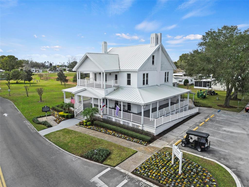 2673 Cayman Circle, Unit R38 Zellwood, FL 32798 - Photo 29 of 63 a view of a house with a yard and roof
