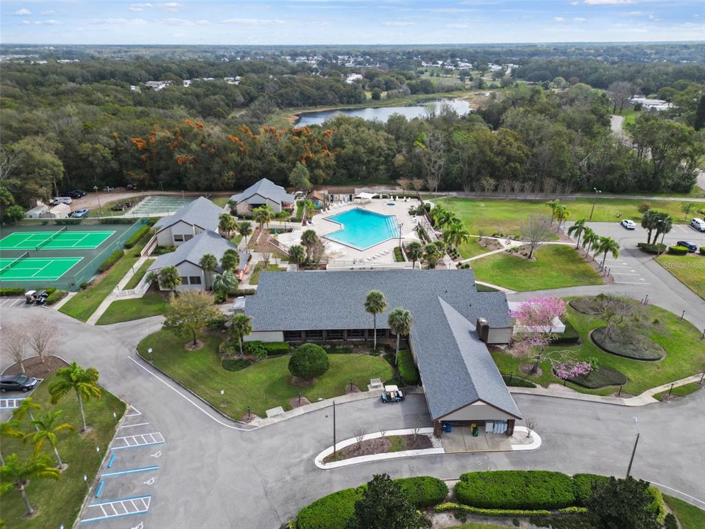 2673 Cayman Circle, Unit R38 Zellwood, FL 32798 - Photo 30 of 63 an aerial view of a pool with a yard