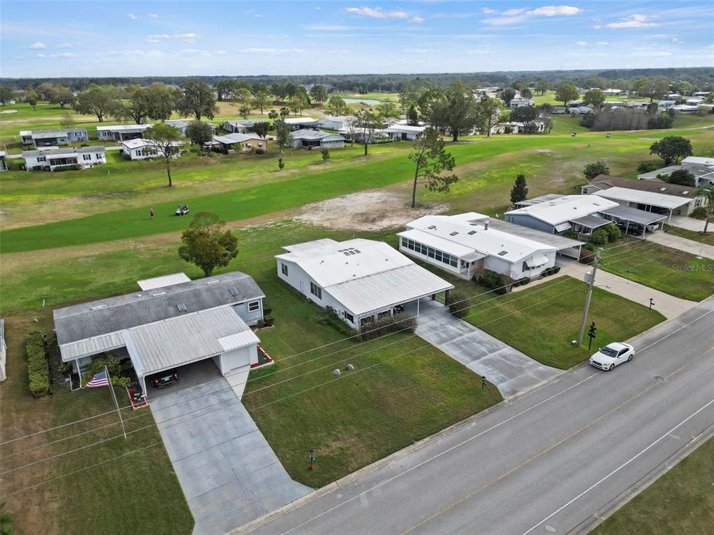 2673 Cayman Circle, Unit R38 Zellwood, FL 32798 - Photo 35 of 63 an aerial view of a house with a garden