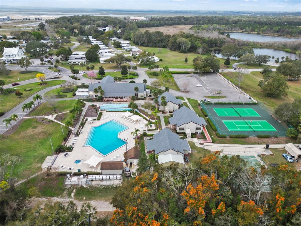 2673 Cayman Circle, Unit R38 Zellwood, FL 32798 - Photo 51 of 63 an aerial view of residential houses with outdoor space and river