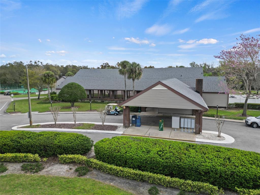 2673 Cayman Circle, Unit R38 Zellwood, FL 32798 - Photo 63 of 63 a view of a house with a yard