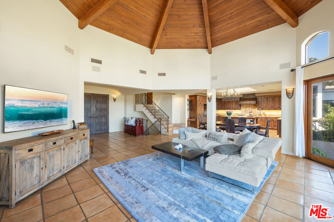 3854 Rambla Orienta Malibu, CA 90265 - Photo 33 of 33 a living room with furniture and a flat screen tv