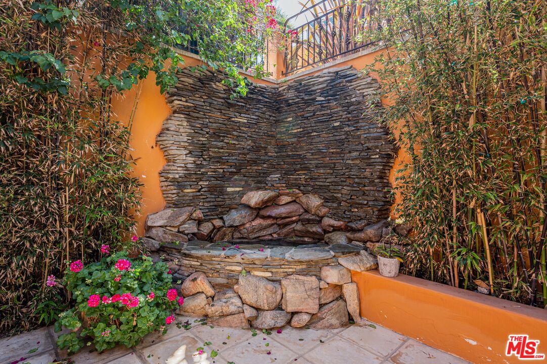 3854 Rambla Orienta Malibu, CA 90265 - Photo 4 of 33 a view of a yard with wooden fence