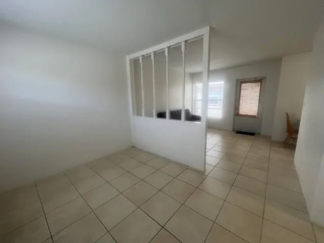 an empty room with windows