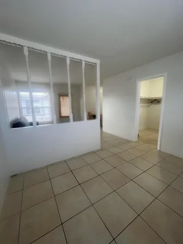 a view of a room with rack on the wall