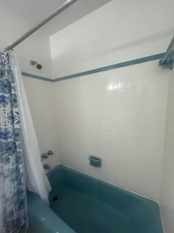 a bathroom with a bathtub