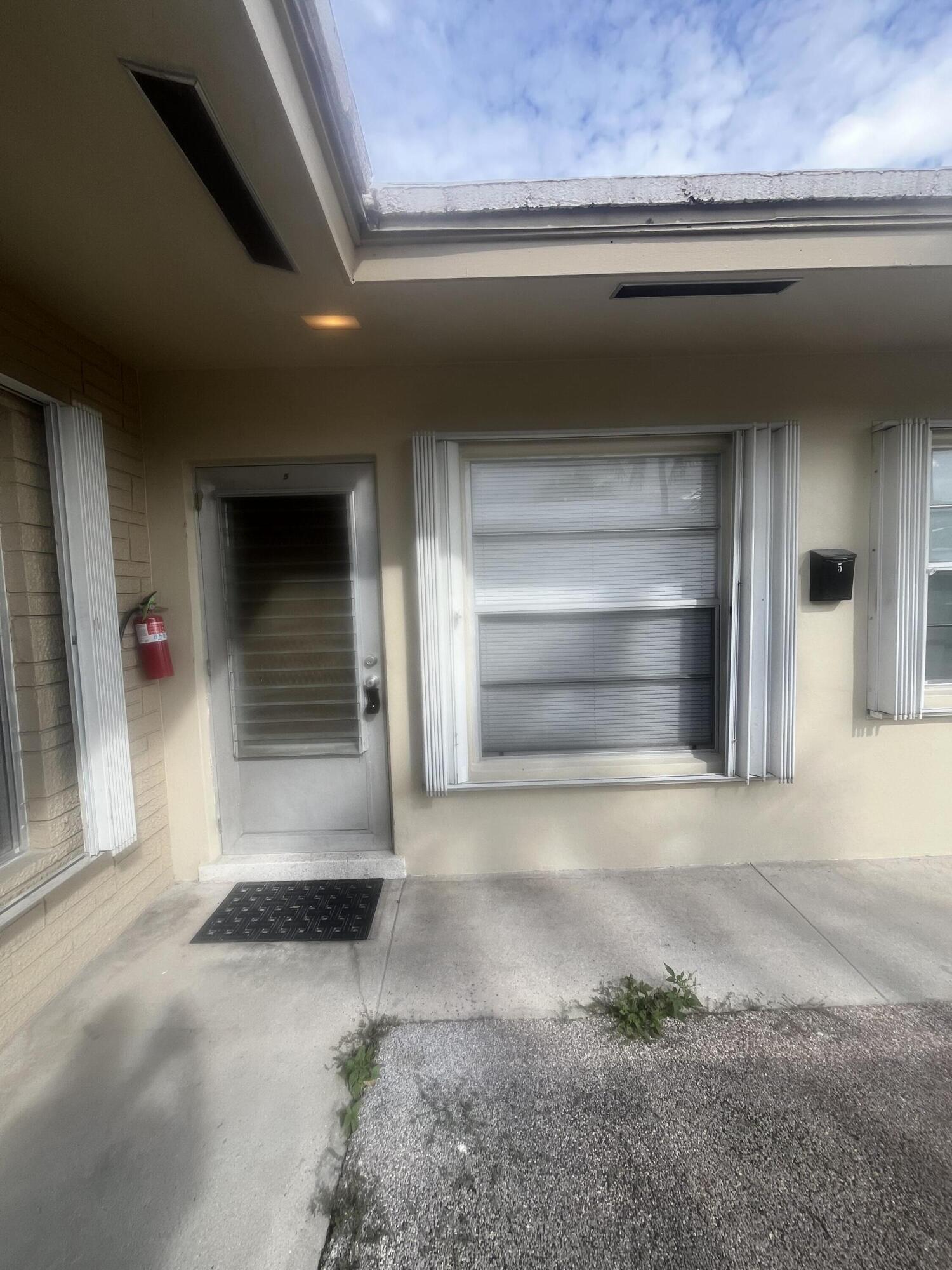 1017 Southeast 3rd Street, Unit 5 Deerfield Beach, FL 33441 - Photo 2 of 16 a view of an empty room