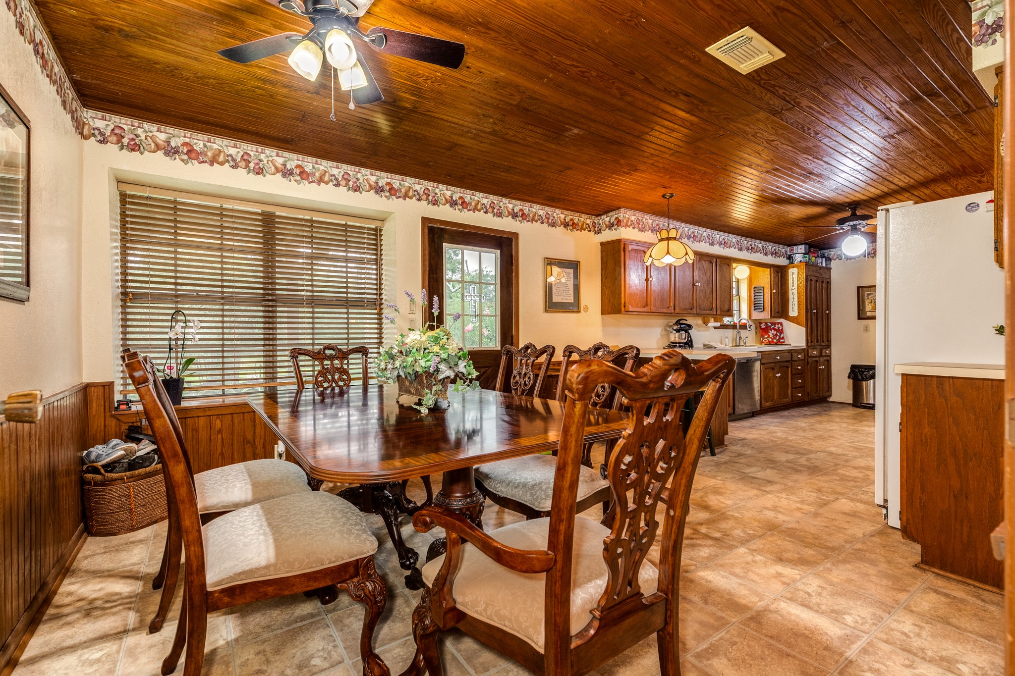 4821 County Road 288 Angleton, TX 77515 - Photo 14 of 35 a view of a dining room with furniture window and outside view