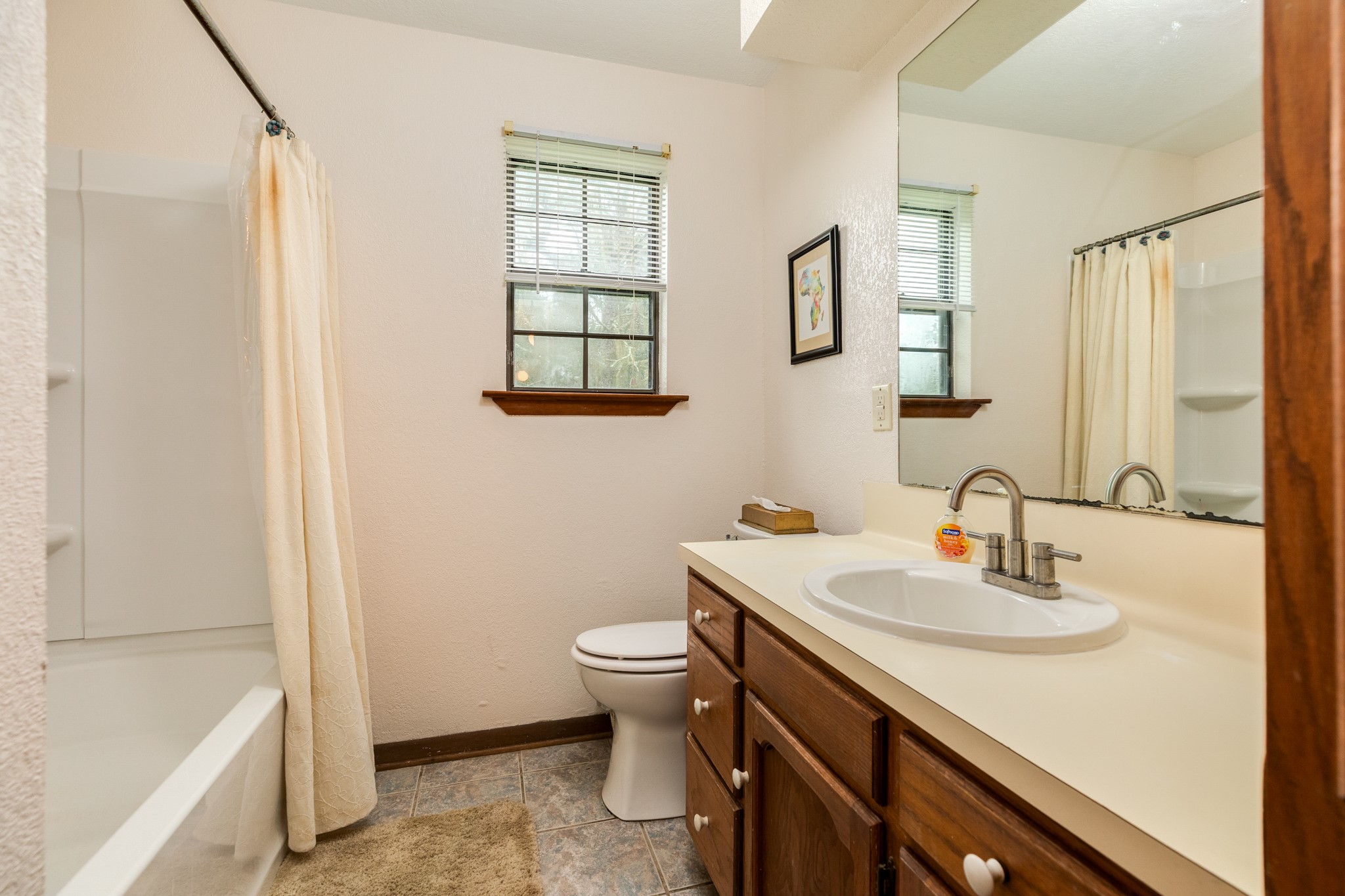 4821 County Road 288 Angleton, TX 77515 - Photo 24 of 35 a bathroom with a sink a toilet and shower