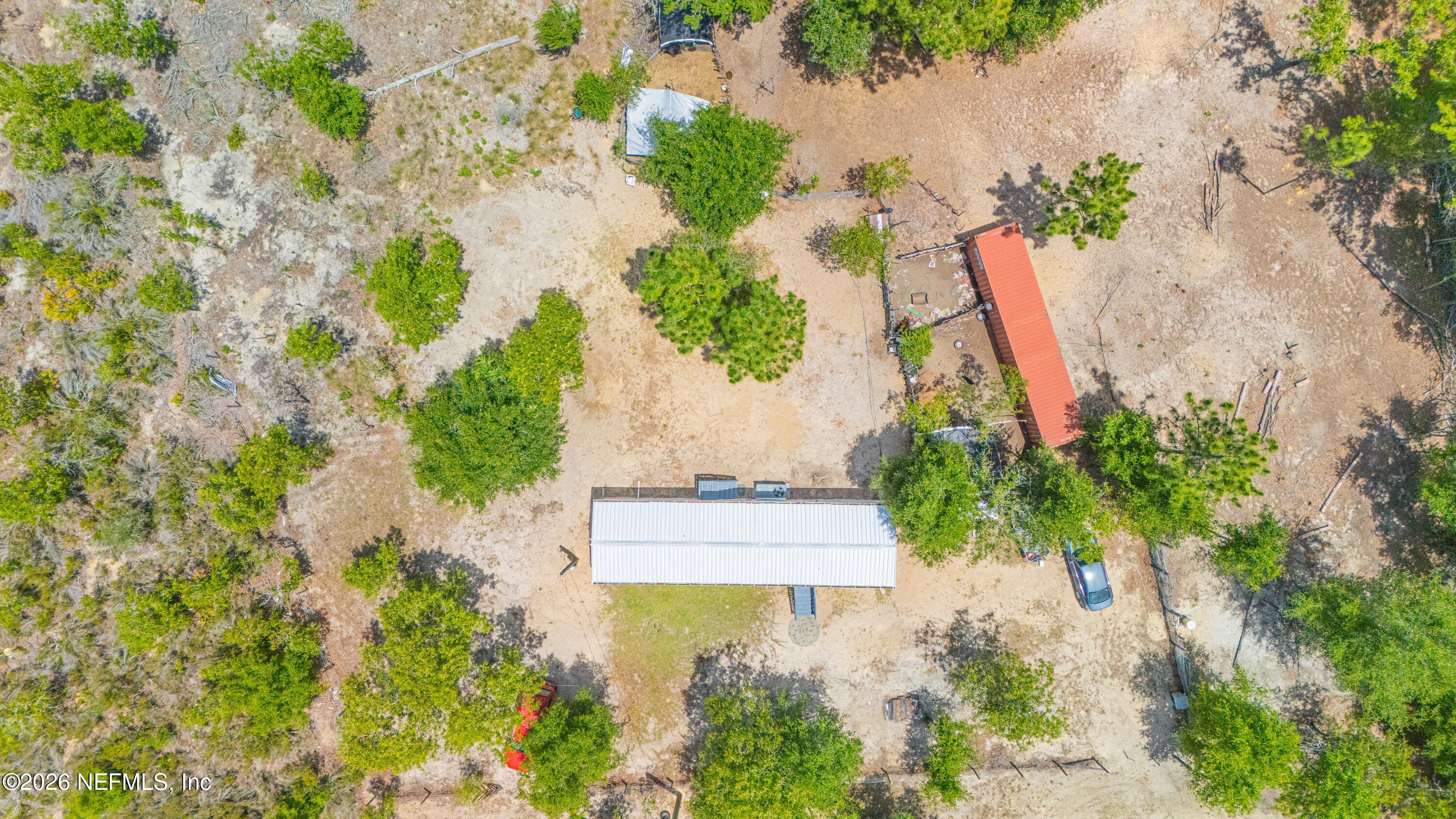 116 London Avenue Interlachen, FL 32148 - Photo 17 of 25 an aerial view of a residential houses with yard