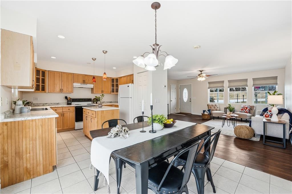 3699 Mitchell Road New Castle, PA 16105 - Photo 9 of 14 a large kitchen with a table and chairs