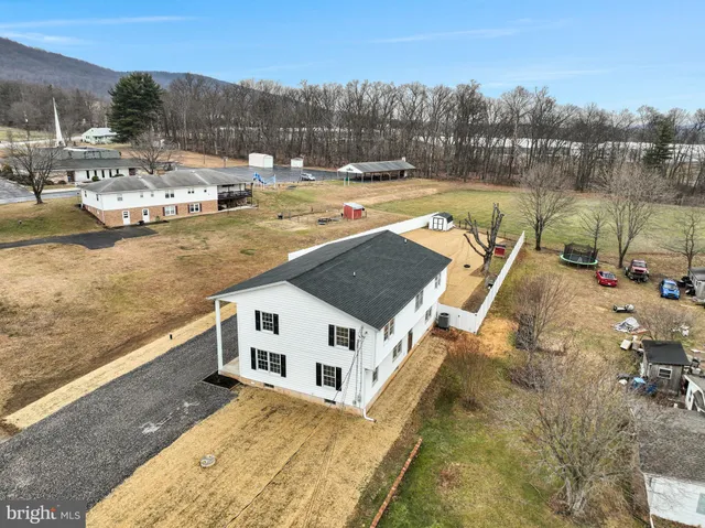 a view of a house with a mountain