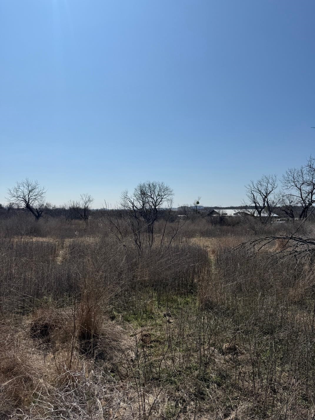 Tbd Hale Street Llano, TX 78643 - Photo 5 of 16 a view of a lake view and mountain view