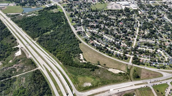 a view of a yard from a balcony